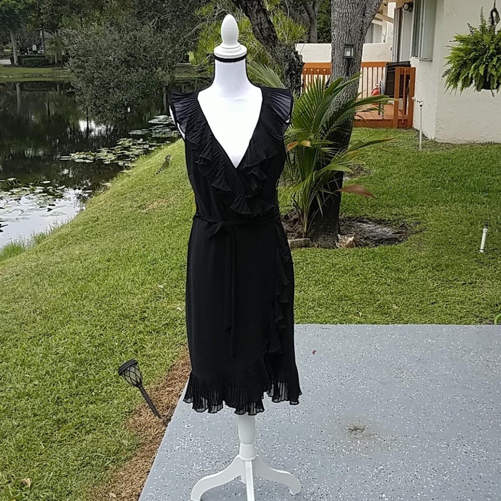 White House Black Market Elegant black dress.